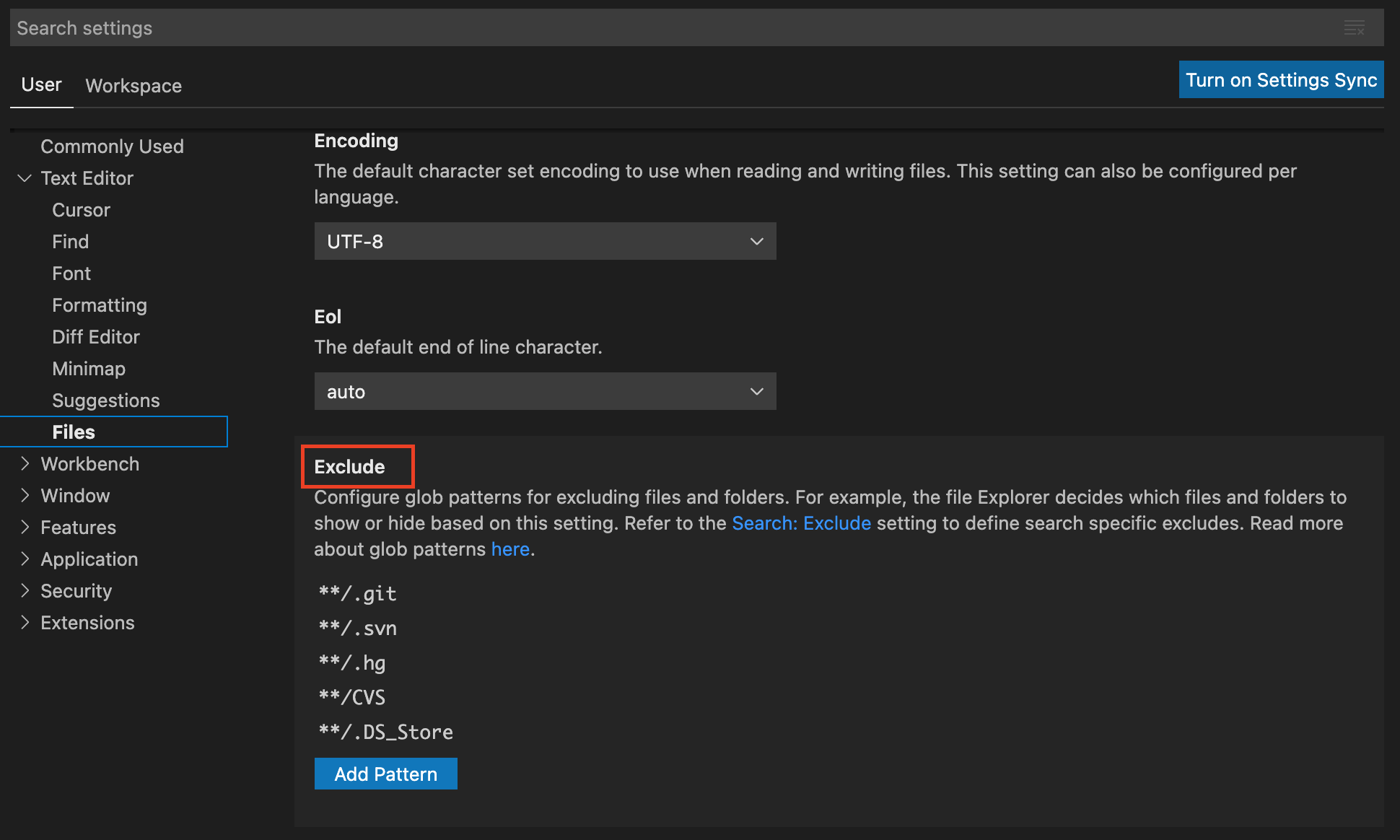 此图突出显示了 VS Code 的 GUI，用于在用户设置中排除文件。